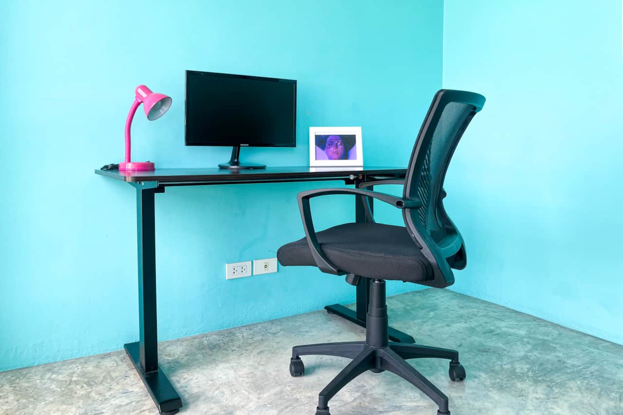 Adjustable chair & adjustable table with monitor.