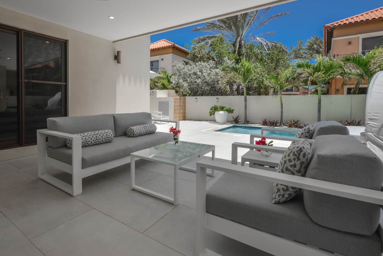Relax in one of the many lounging areas in our private backyard