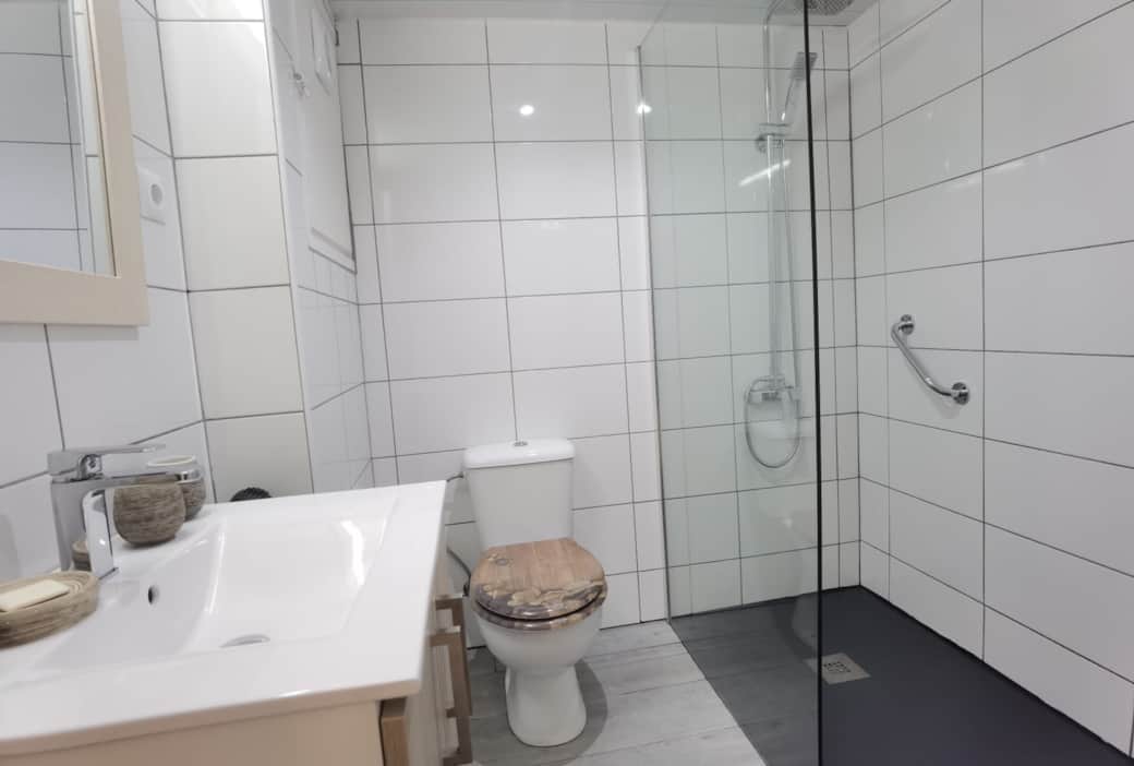 A modern bathroom with walk in shower A modern bathroom with walk in shower