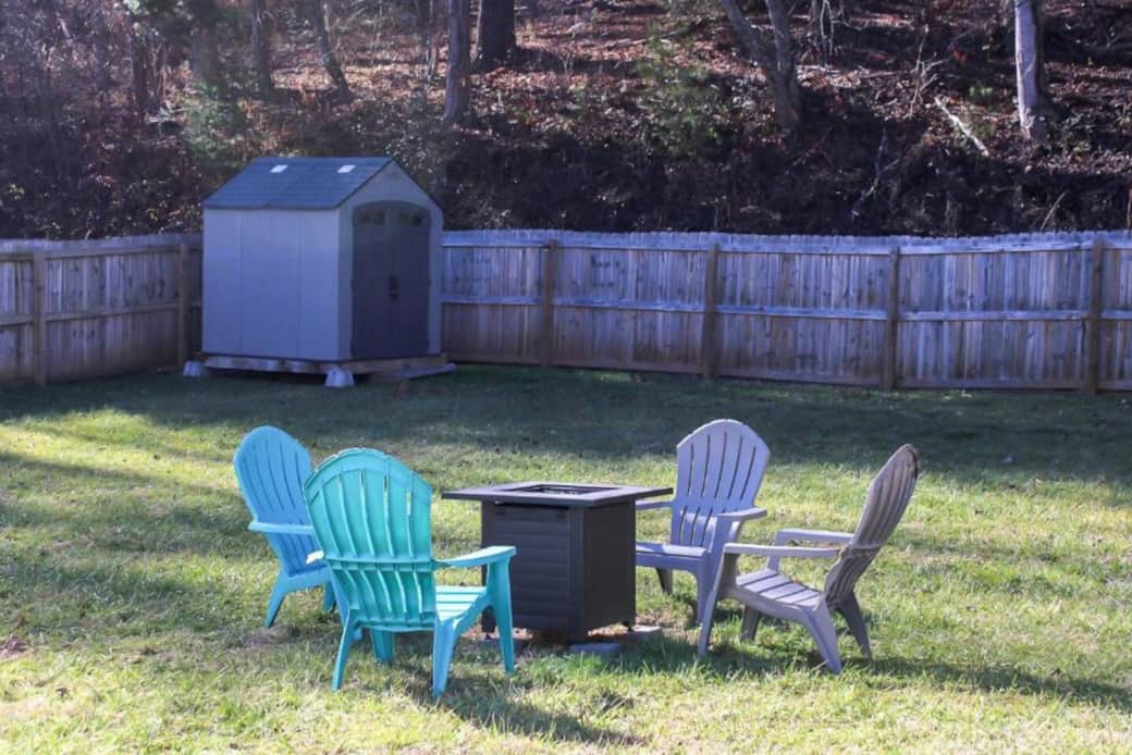 Fenced in yard with propane fire table Fenced in yard with propane fire table