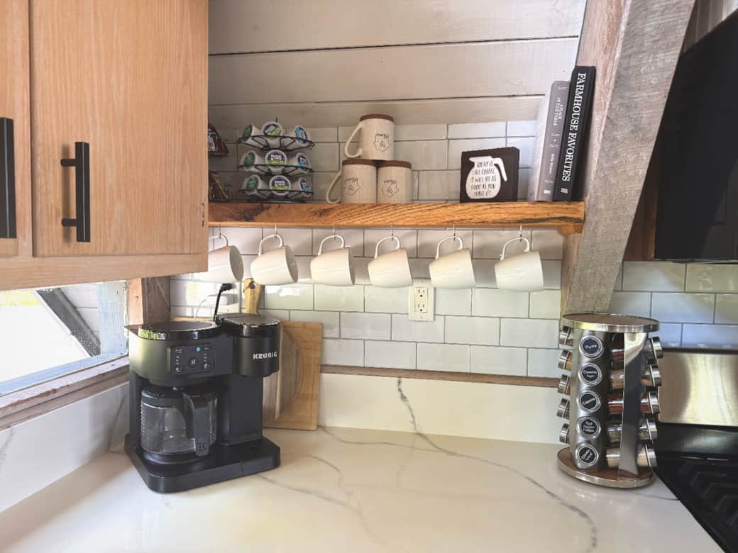 Coffee maker, coffee supplies, tea and fully stocked spice rack