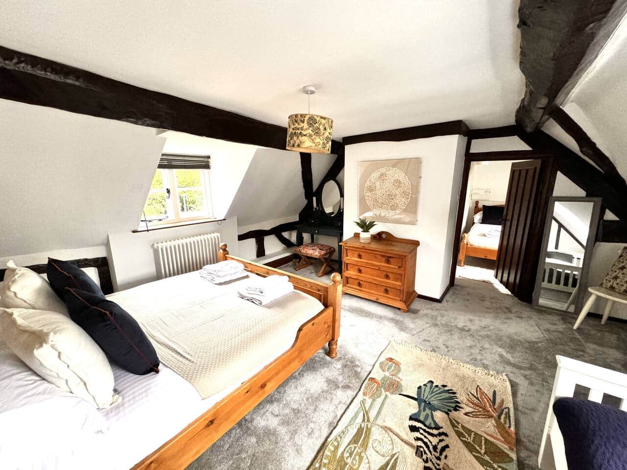 A beamed bedroom in the Tudor cottage