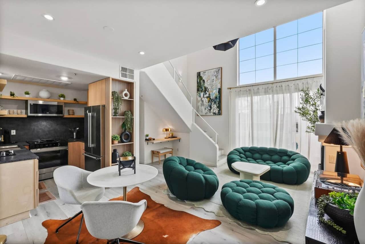 Open layout flows into the kitchen and dining area just steps away.