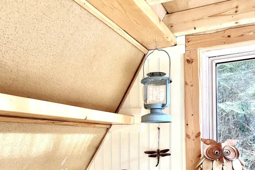 Built-in shelves, dishrack, fire extinguisher, and whimsical items Built-in shelves, dishrack, fire extinguisher, and whimsical items