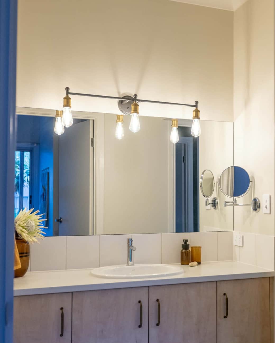 The main vanity space, with bright yet dimmable lighting and magnifying mirror, the perfect place to refresh.