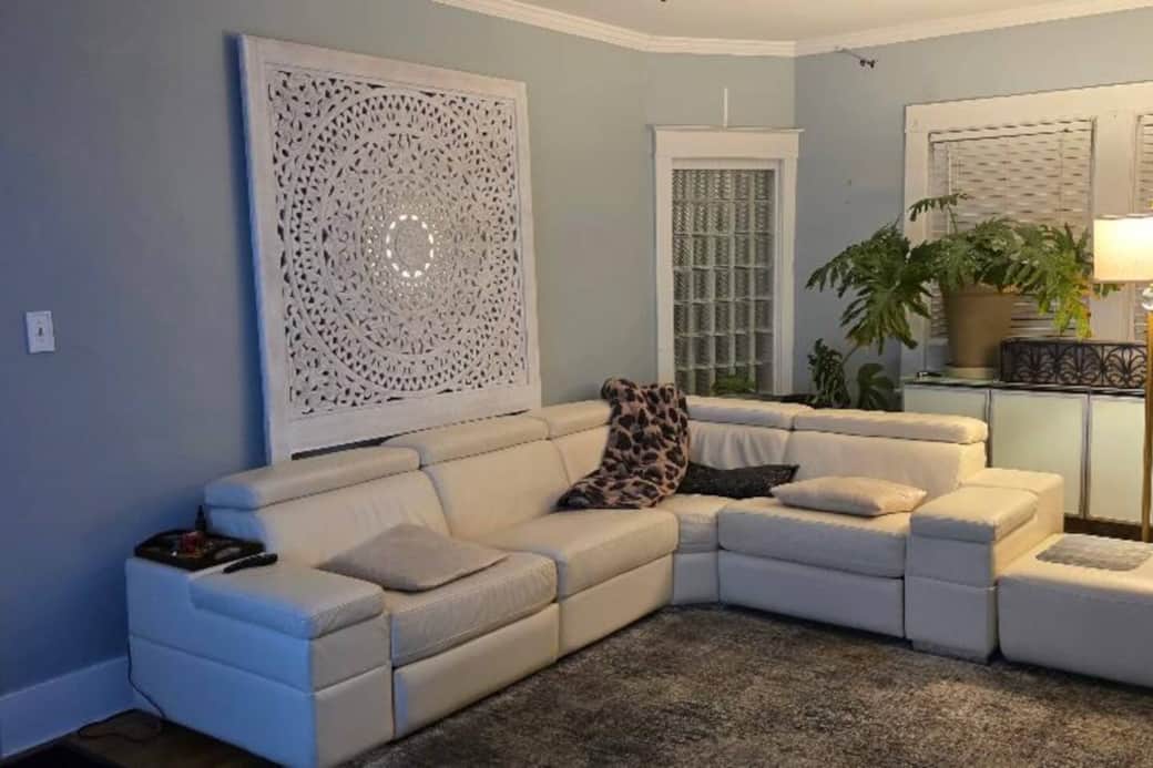 Relax after a long day exploring the city in the cozy living room that features plenty of seating for a movie night with the 65" Smart TV. 