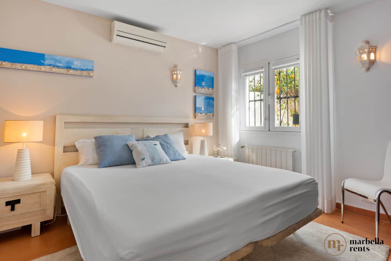 Bedroom with king size bed.