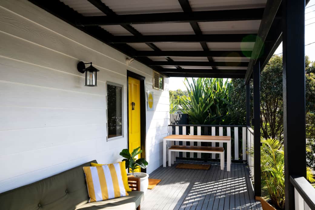 Sunny front balcony offering a peaceful place to unwind throughout the day