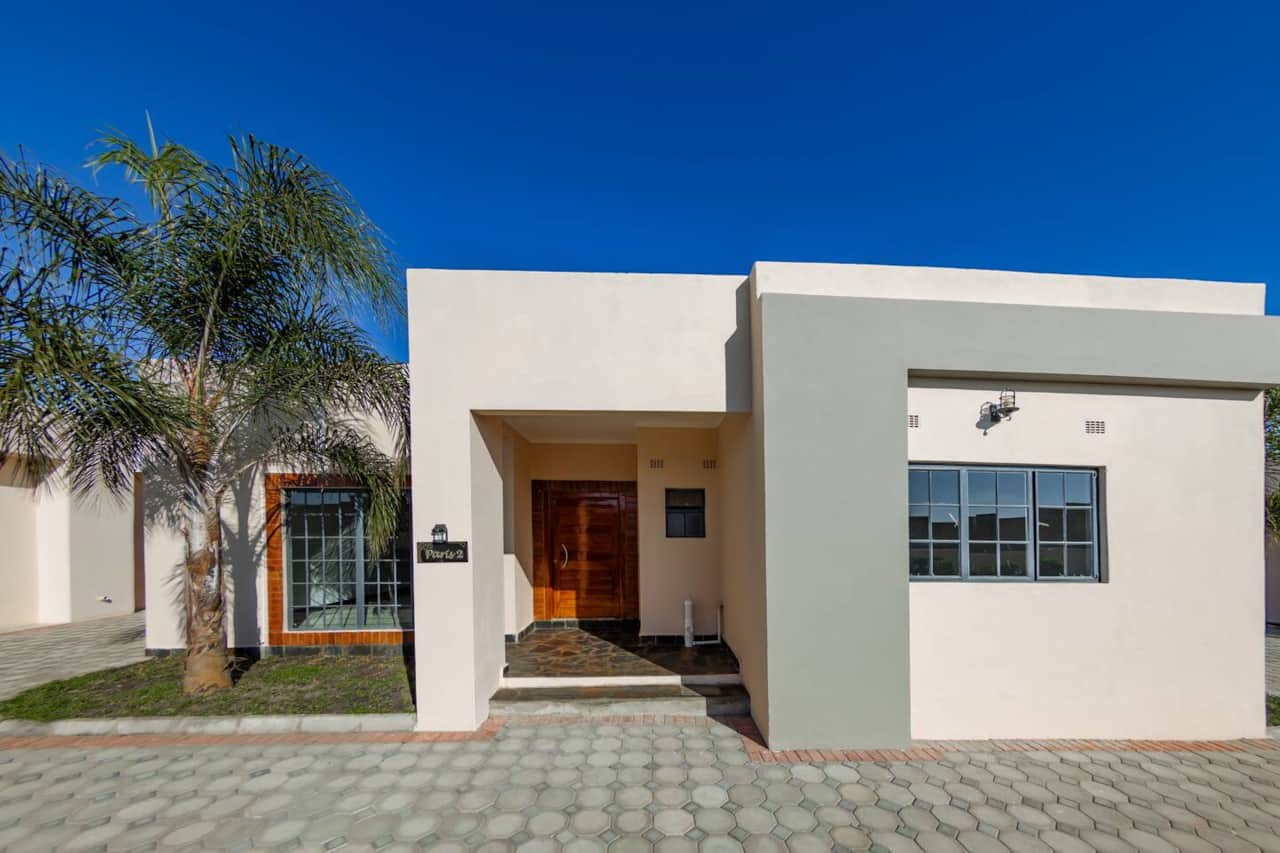 Unit exterior within the property courtyard