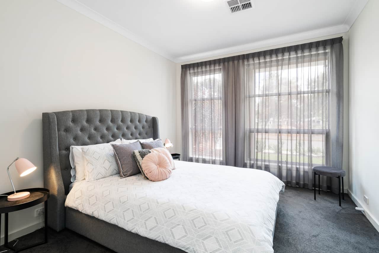 Bedroom 1: Luxurious sanctuary with walk-in robe and ensuite. Elegant and functional retreat.