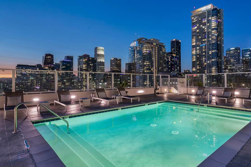 Inviting rooftop retreat adorned with tasteful furnishings, including a refreshing pool, trendy lounge, and mesmerizing panoramic sights, creating a comfortable and stylish haven.
