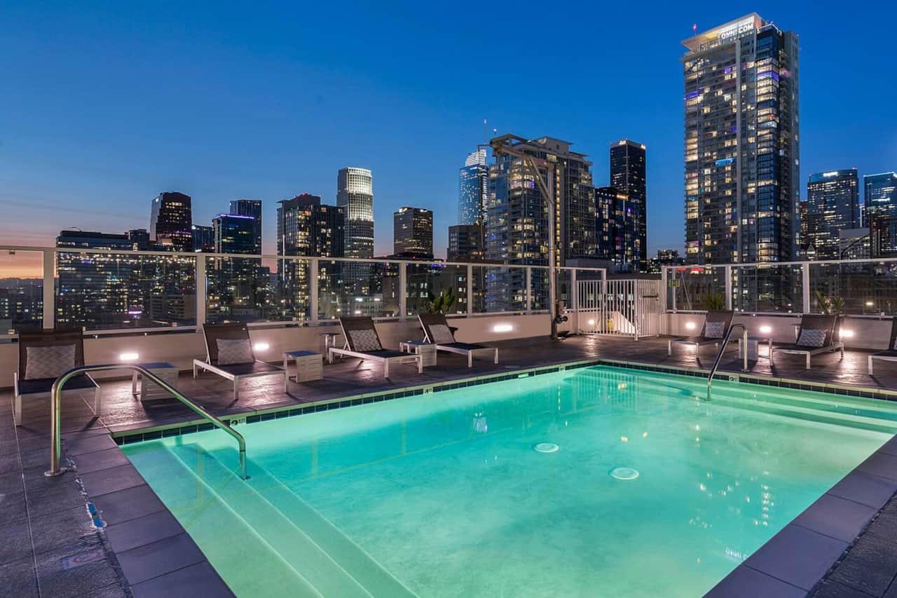 Inviting rooftop retreat adorned with tasteful furnishings, including a refreshing pool, trendy lounge, and mesmerizing panoramic sights, creating a comfortable and stylish haven.
