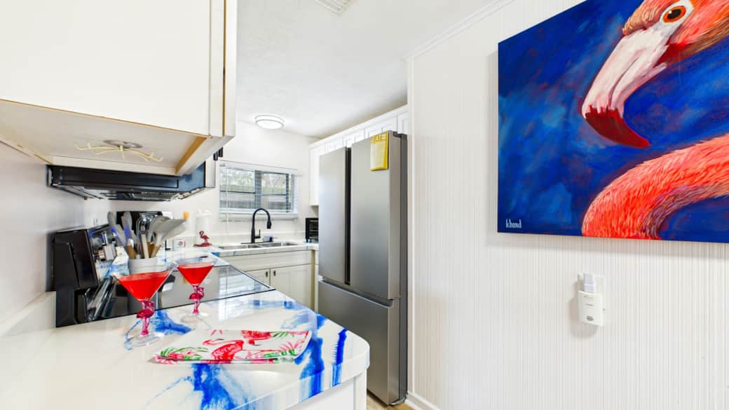 A full size refrigerator has a working ice maker and cold water. A full size refrigerator has a working ice maker and cold water.