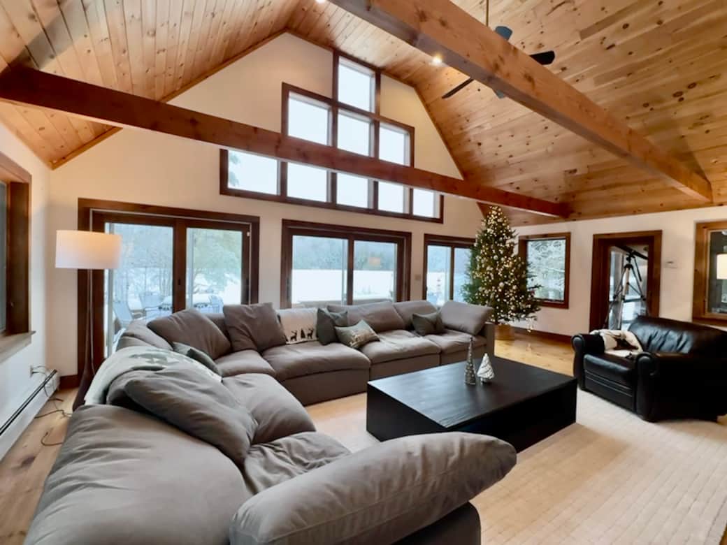 Warm modern-rustic living spaces with peaceful waterfront views