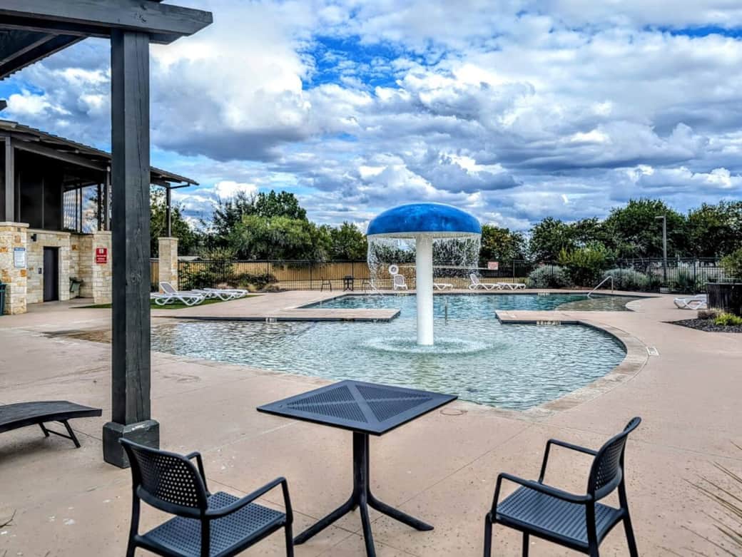Community pool with splash pad