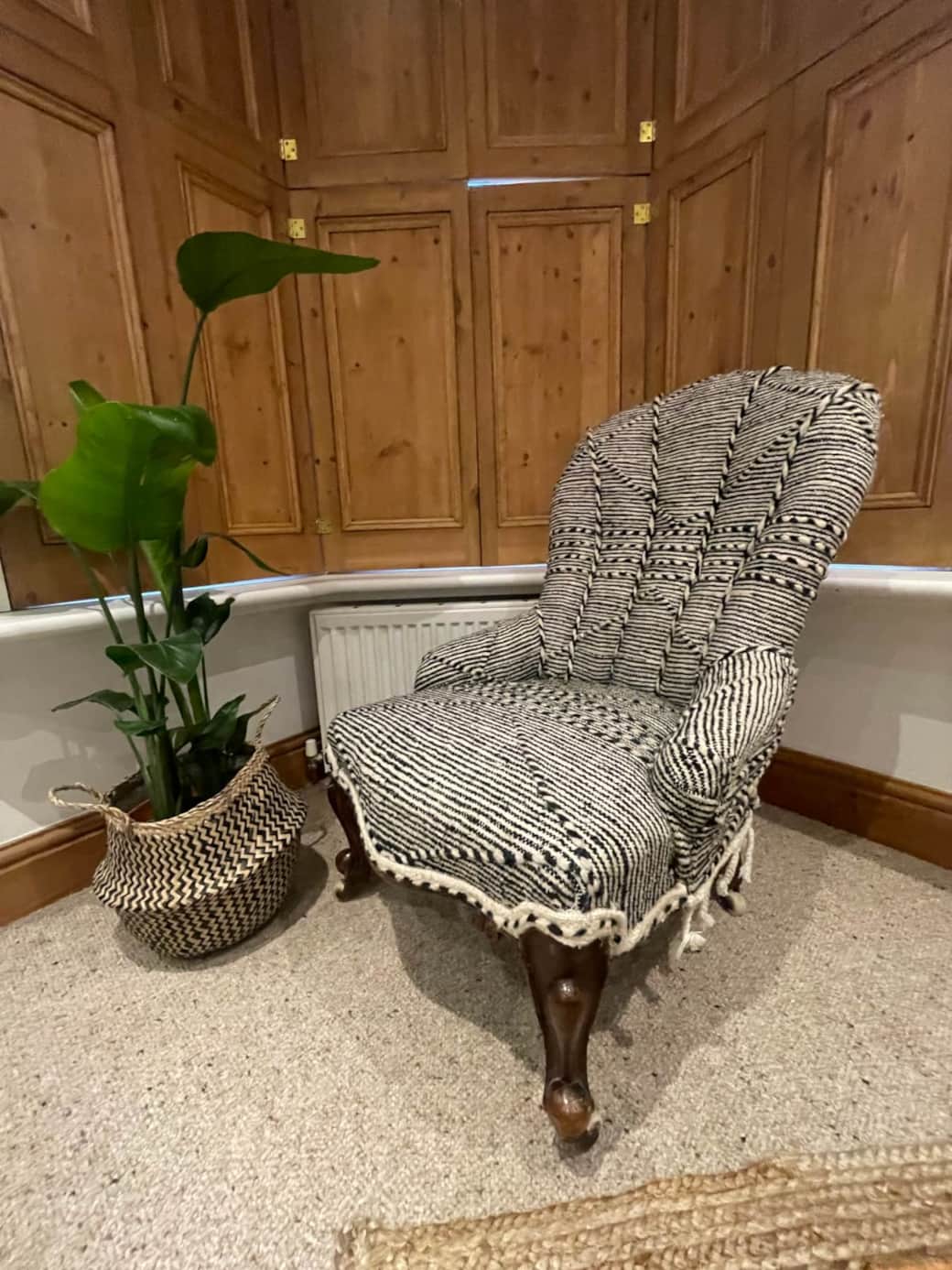 Antique Victorian slipper chair upholstered in Moroccan Zanaffi rug