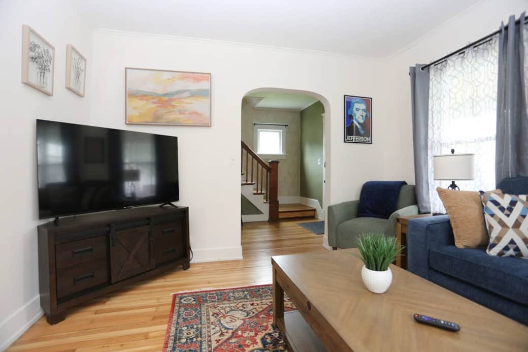 Spacious living room with 55" Smart TV, sleeper sofa for extra guests. Located on main floor.