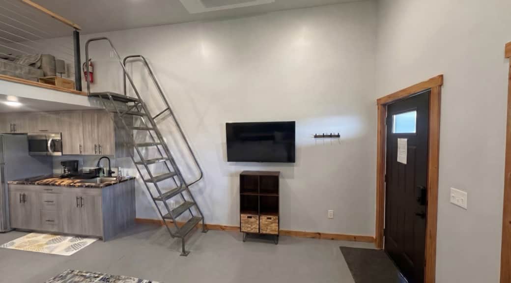 Entertainment area featuring a wall-mounted flat-screen TV in the Black Hills, SD.