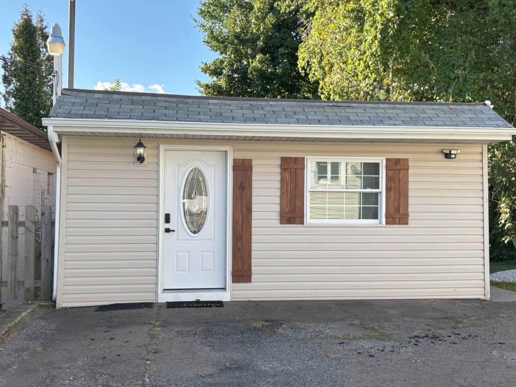 The apartment welcomes you with a clean, well-kept exterior and a private entryway. The front area is well-lit for easy access at any time of day, making check-in smooth and convenient.
