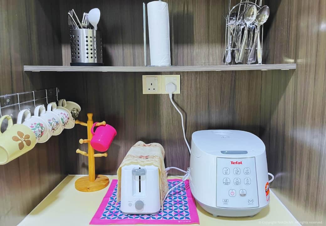 Kitchen island station with air fryer and kettle. Kitchen island station with air fryer and kettle.