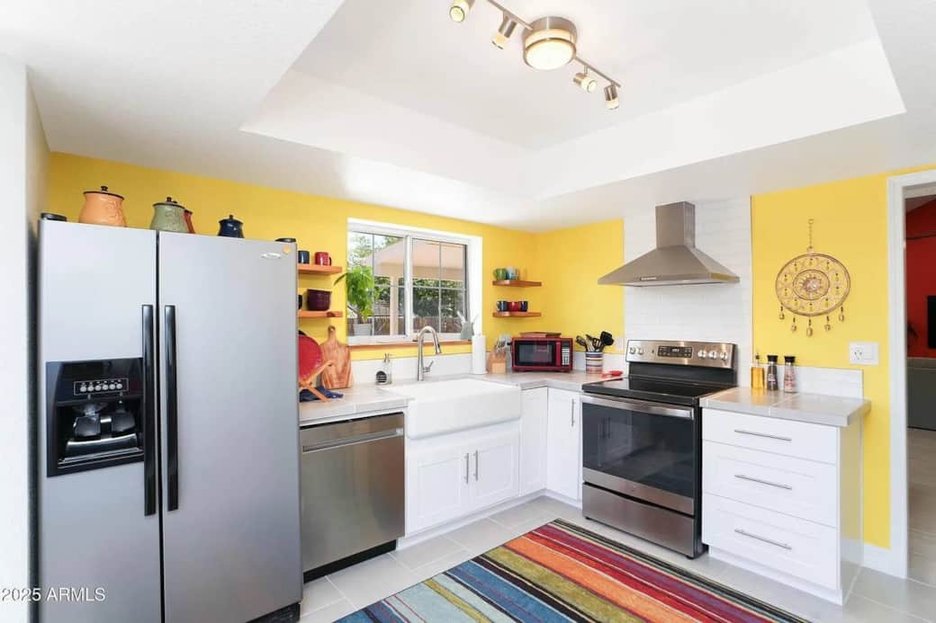 Clean and updated kitchen with stainless steel appliances—perfect for preparing meals after hiking Sedona trails