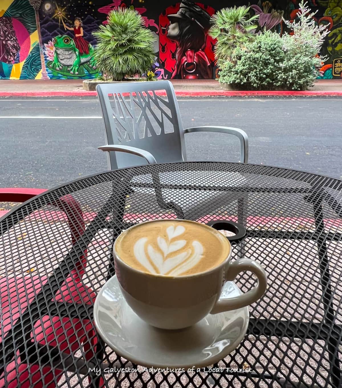 Kelly Chapman enjoying coffee at Mod Coffeehouse in downtown Galveston