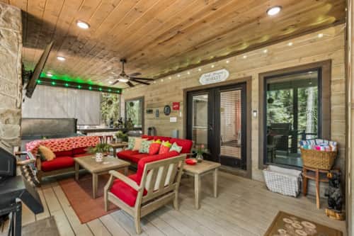 Aerial view of Oklahoma Sky cabin nestled in tall pines