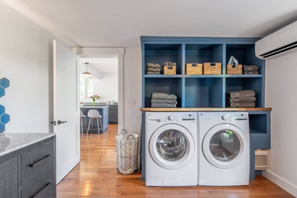 The laundry room is located in the bathroom on the main floor. Here you can find towels, beach towels, laundry soap, and a bunch of bathroom essentials!