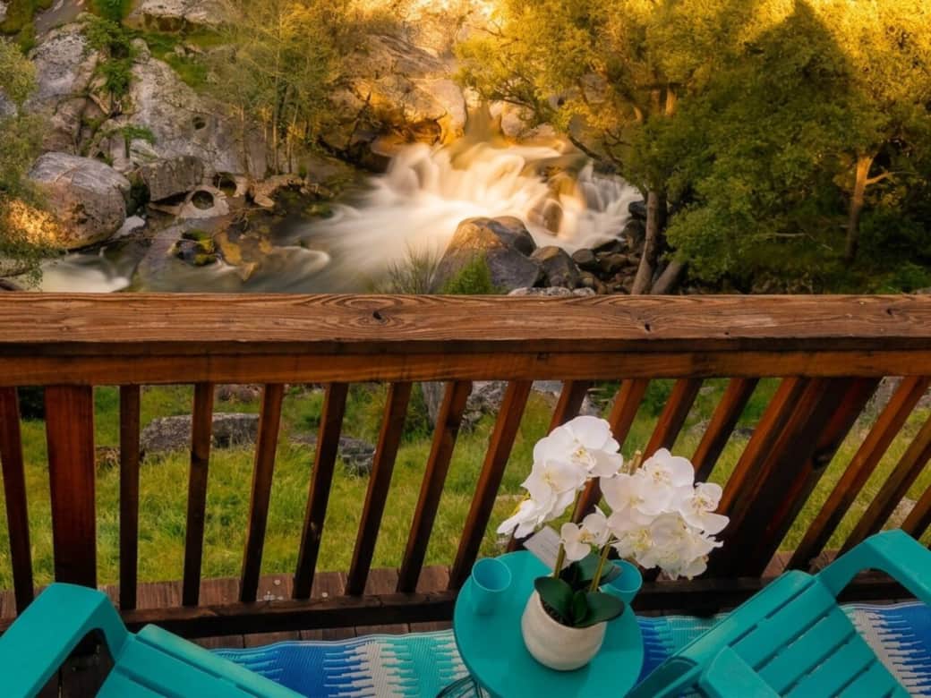 Relax on the deck with river views — grab a glass of wine and let the rushing water set the mood