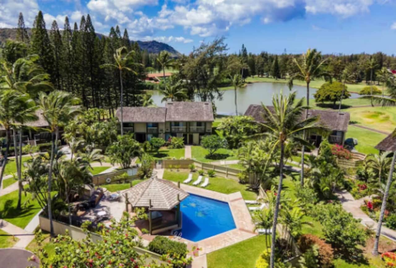 Just steps away from your front door is one of three pools on property.  There are two BBQs and lounge chairs for Guests;  just supply the charcoal and food . 