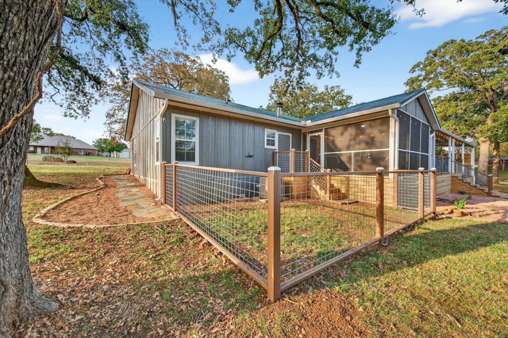 Fully fenced dog run in the backyard