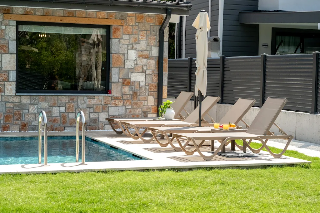 Swimming pool with sun loungers and a patio umbrella, Villa Palmiye B, Gocek