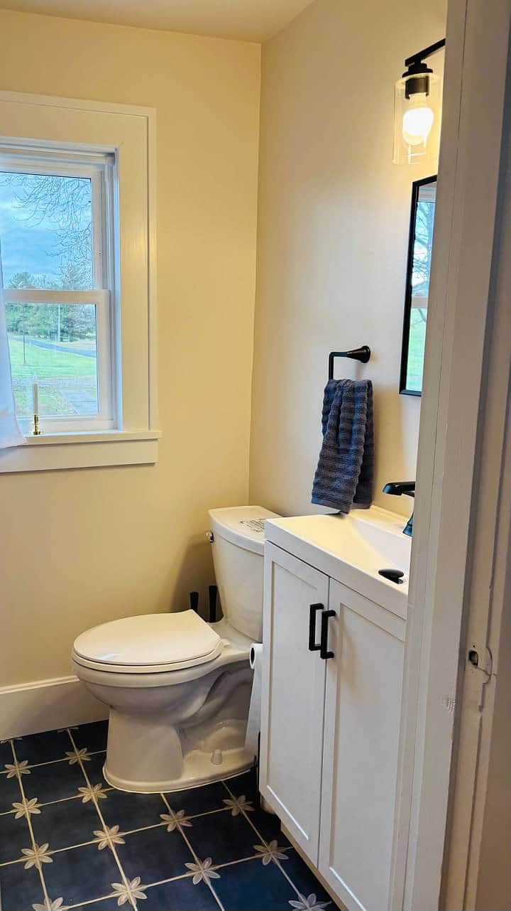 Powder room on the main floor for easy access and comfort Powder room on the main floor for easy access and comfort