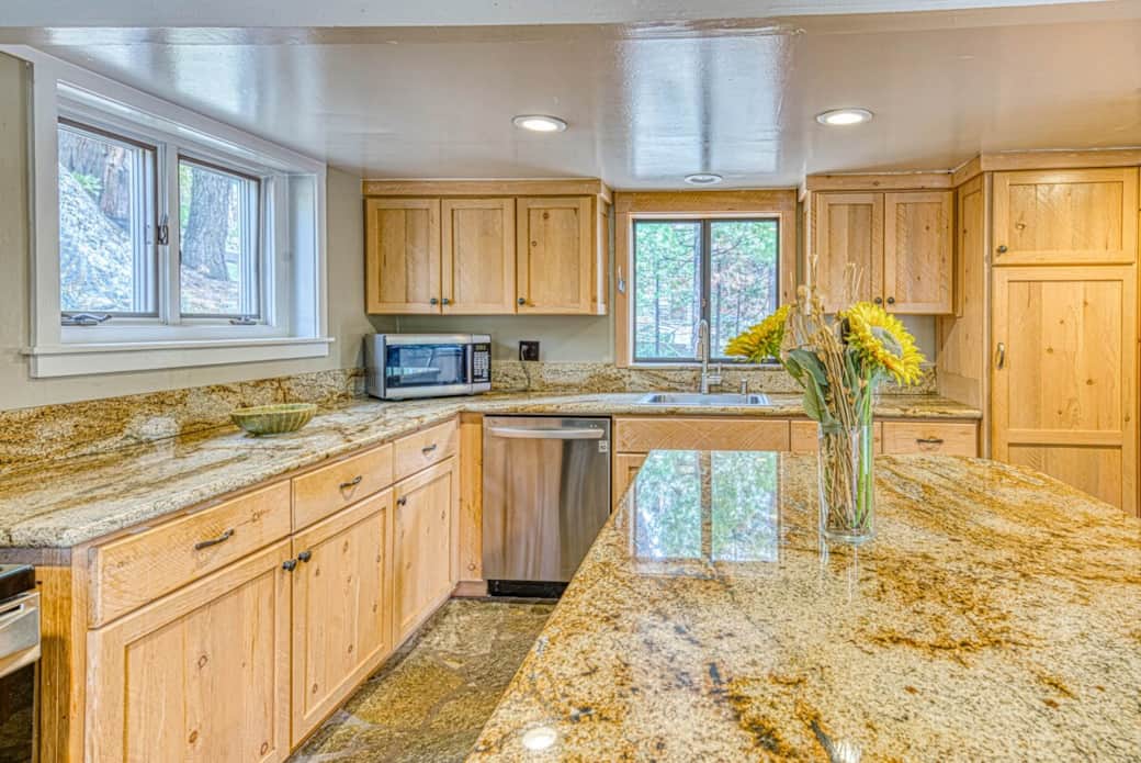 KITCHEN, CUSTOM SINKER WOOD CABINETS, GRANITE COUNTERTOPS, GRANITE ROCK FLOOR
