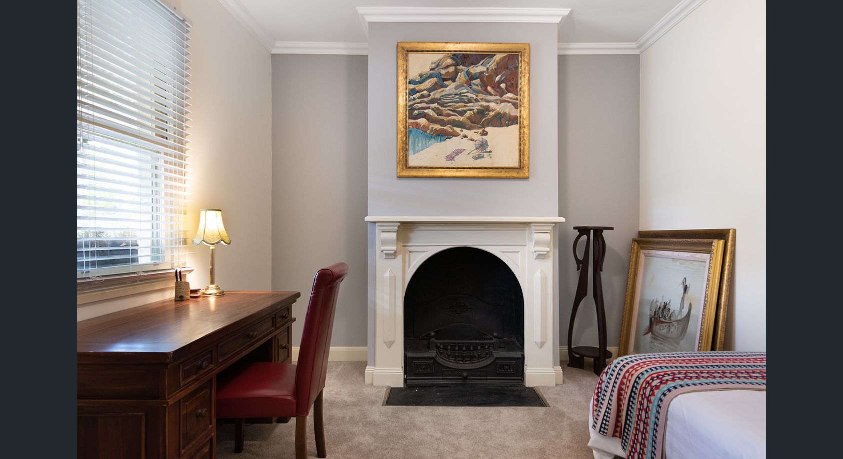 Bedroom with grand fireplace