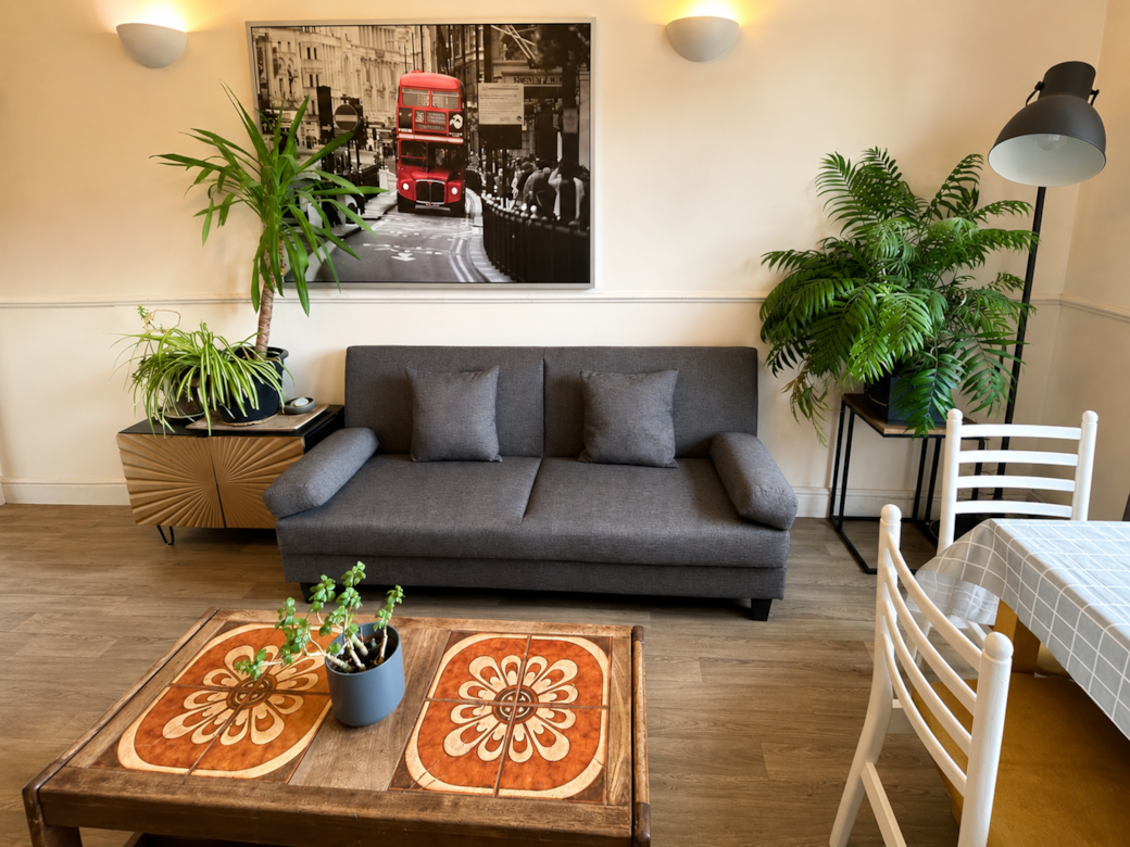 Cosy seating area with TV and home-style decor