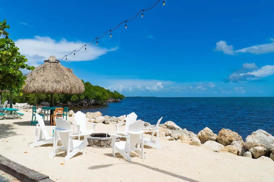 Tiki Hut, Chairs and Lounge Chairs on the Man Made Beach.