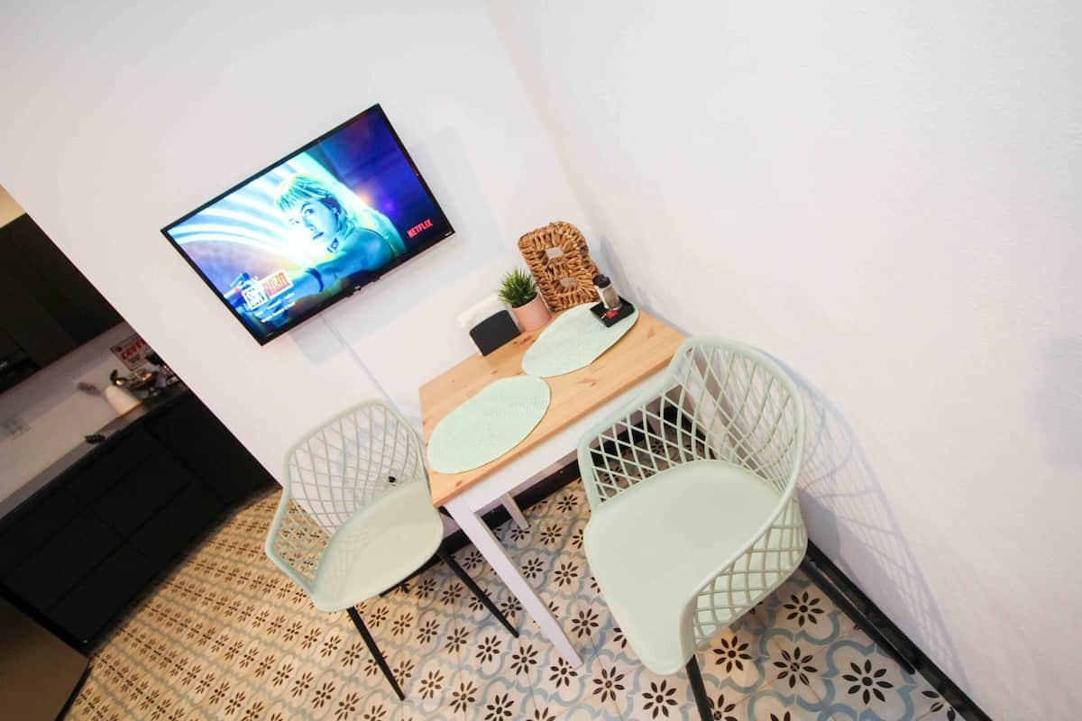 We provide a table for two complete with salt and pepper for your dining convenience.