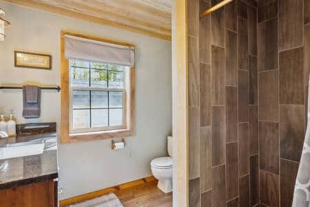 Lower level bathroom complete with shower.