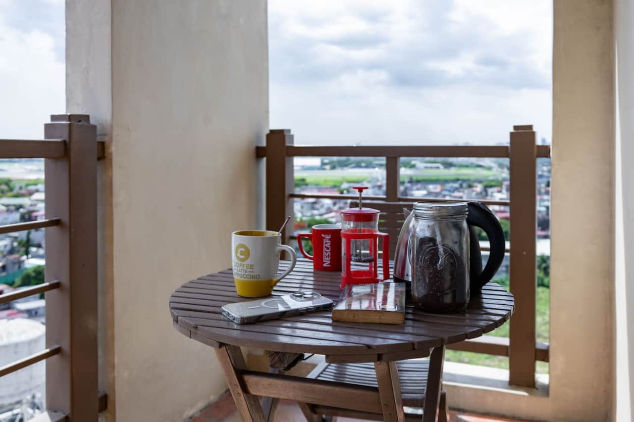 Balcony with Table and Chairs for your coffee in the morning. 