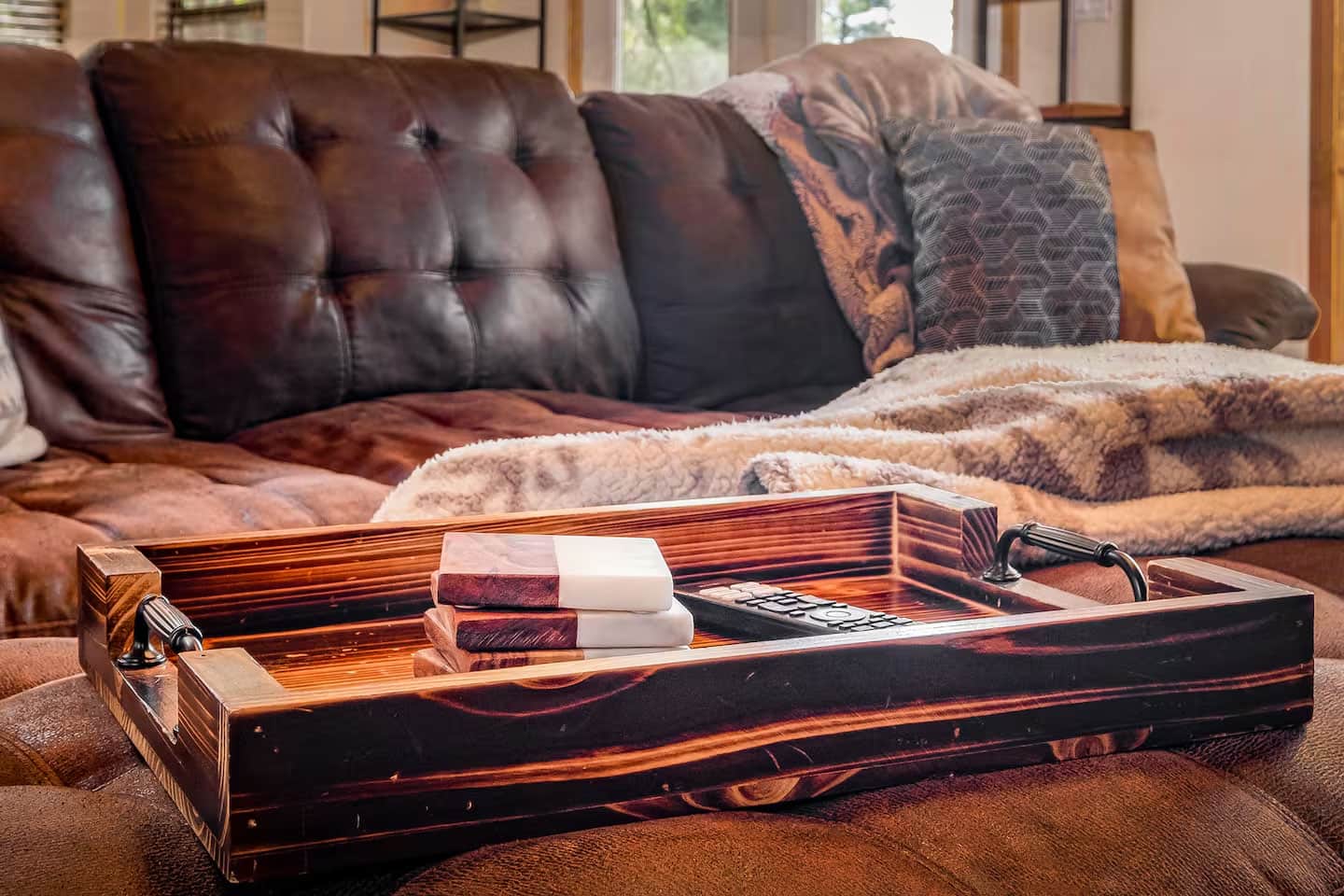 Cozy living room seating with rustic decor in mountain cabin