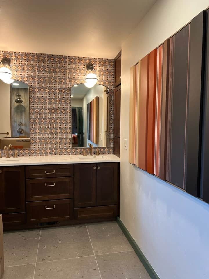 Primary bathroom image art and mirrors