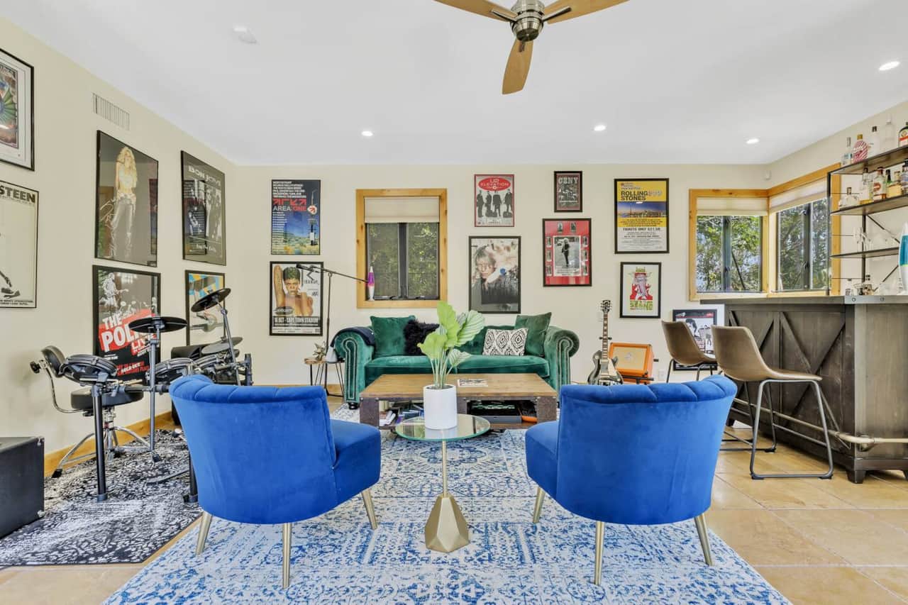 Experience the perfect blend of relaxation and entertainment. Unleash your musical talents with guitars and drums in the vibrant entertainment area. Sink into the cozy sofa, basking in natural light, and enjoy the captivating outside view. 