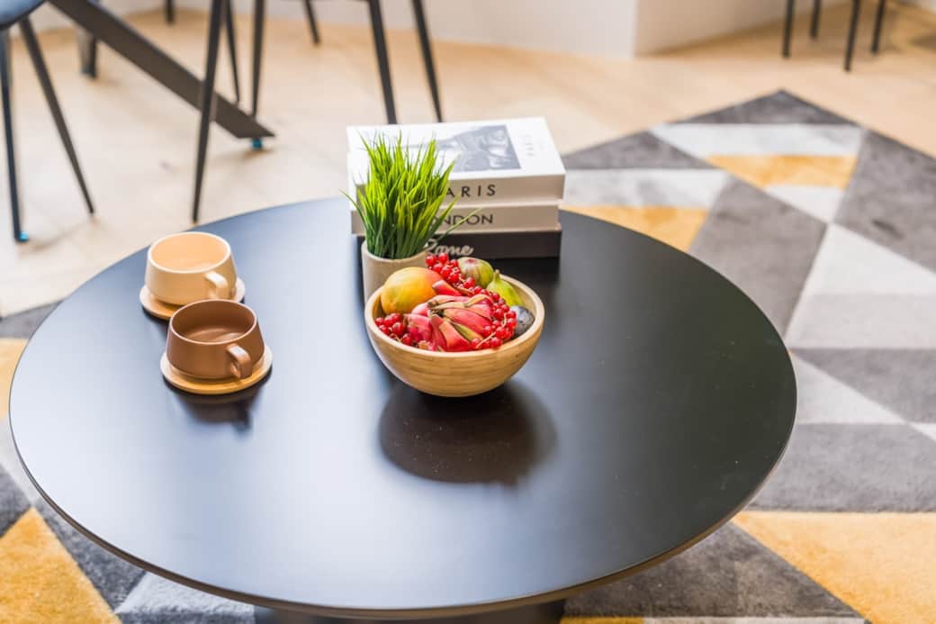 Stylish coffee table setup with a welcoming touch — perfect for morning coffee or a relaxed evening in.