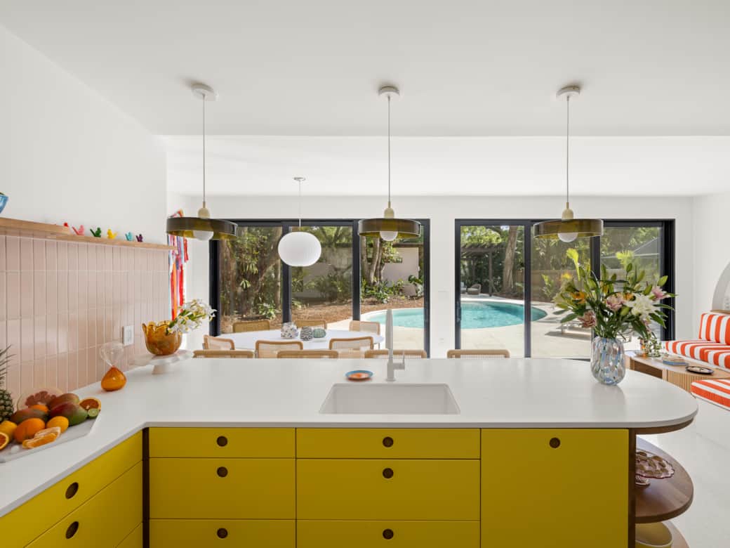Prepare snacks with pool & jungle views.