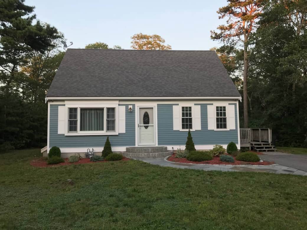 Charming exterior with lush greenery and welcoming lighting, your Cape Cod vacation haven from the moment you arrive.
Charming exterior with lush greenery and welcoming lighting, your Cape Cod vacation haven from the moment you arrive.
