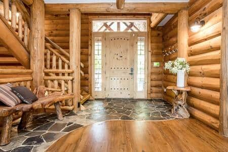 Step inside to beautiful stone and hardwood floors in an open concept living space.