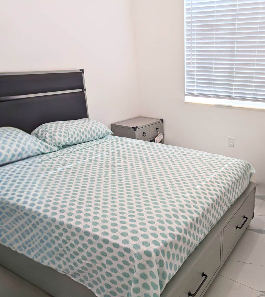 Bedroom 1 – Double Bed – Cozy double bed with natural light & storage.