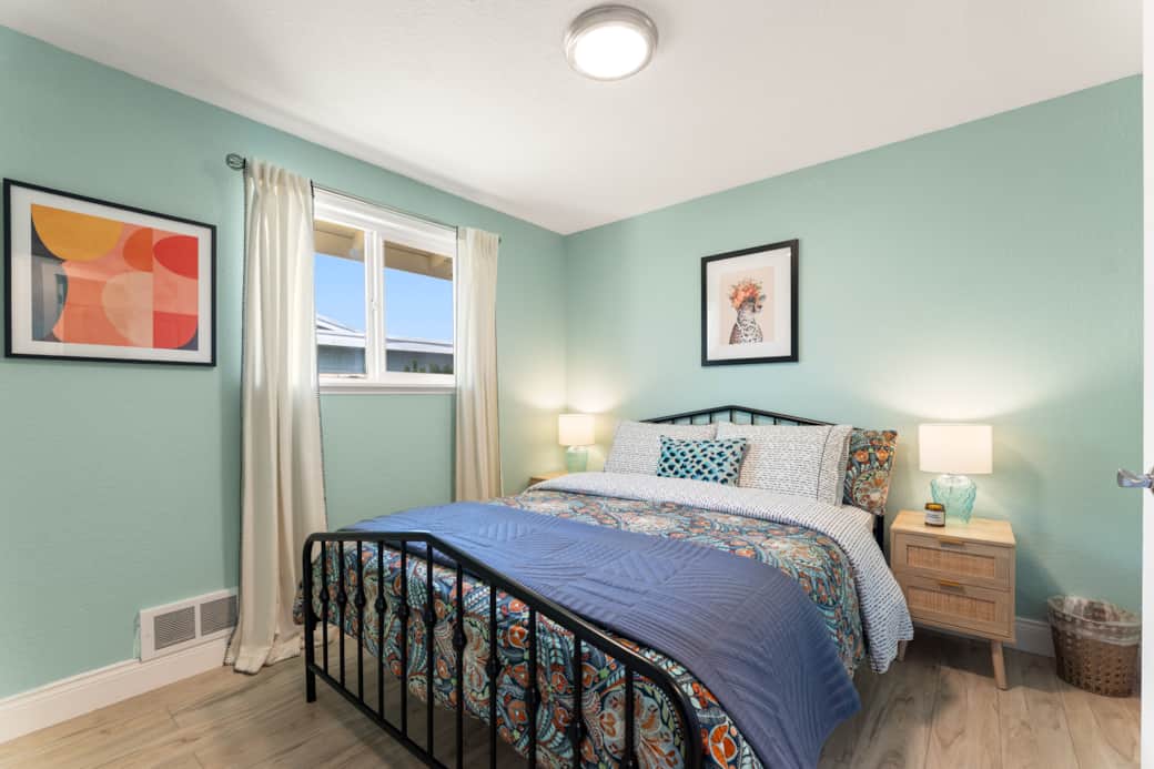Spacious bedroom with queen bed