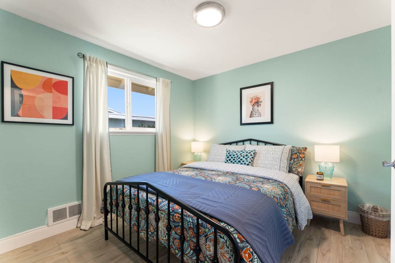 Spacious bedroom with queen bed